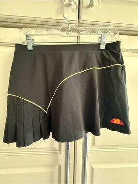 Ellesse Black Top with Orange Logo Accent and Attached Short